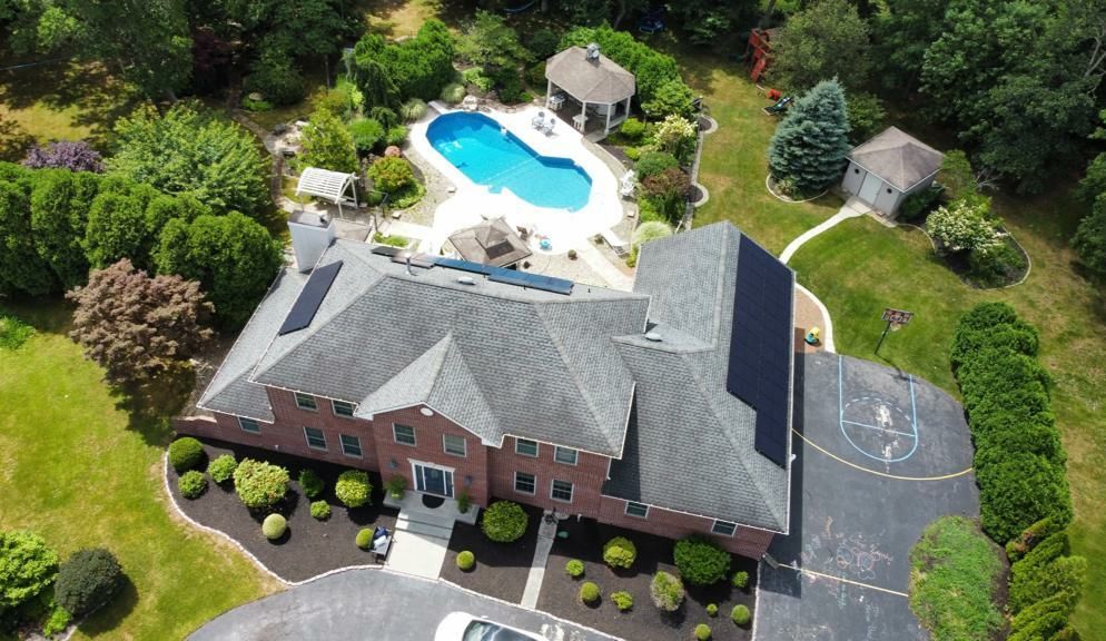A detached home with rooftop solar (our install in Toms River, NJ)