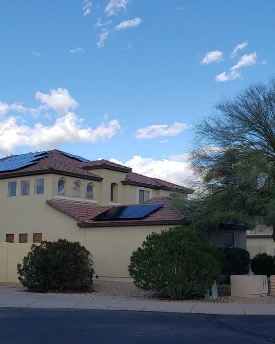 Two-story home with solar panels